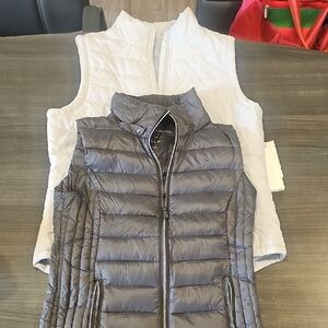 2 Women's White and Gray Quilted Vests